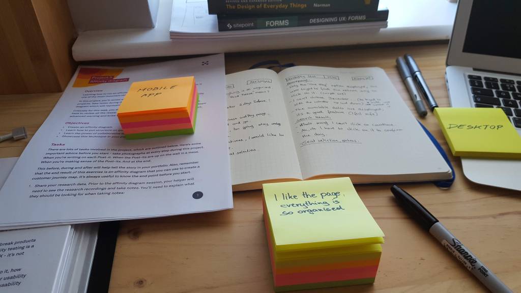 Review usability test records and making notes about different emotions.